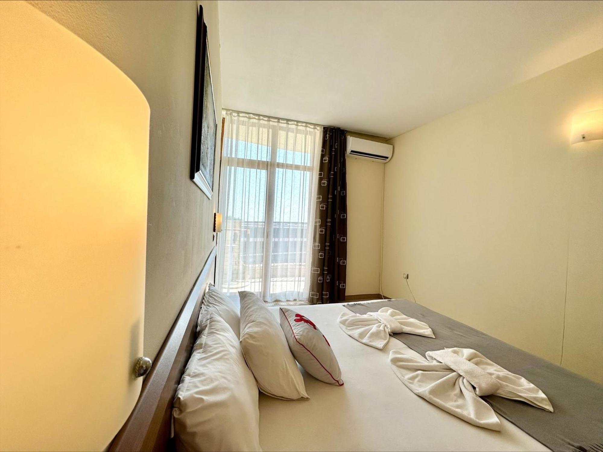 Grenada - Menada Apartments Pantai Sunny Bilik gambar