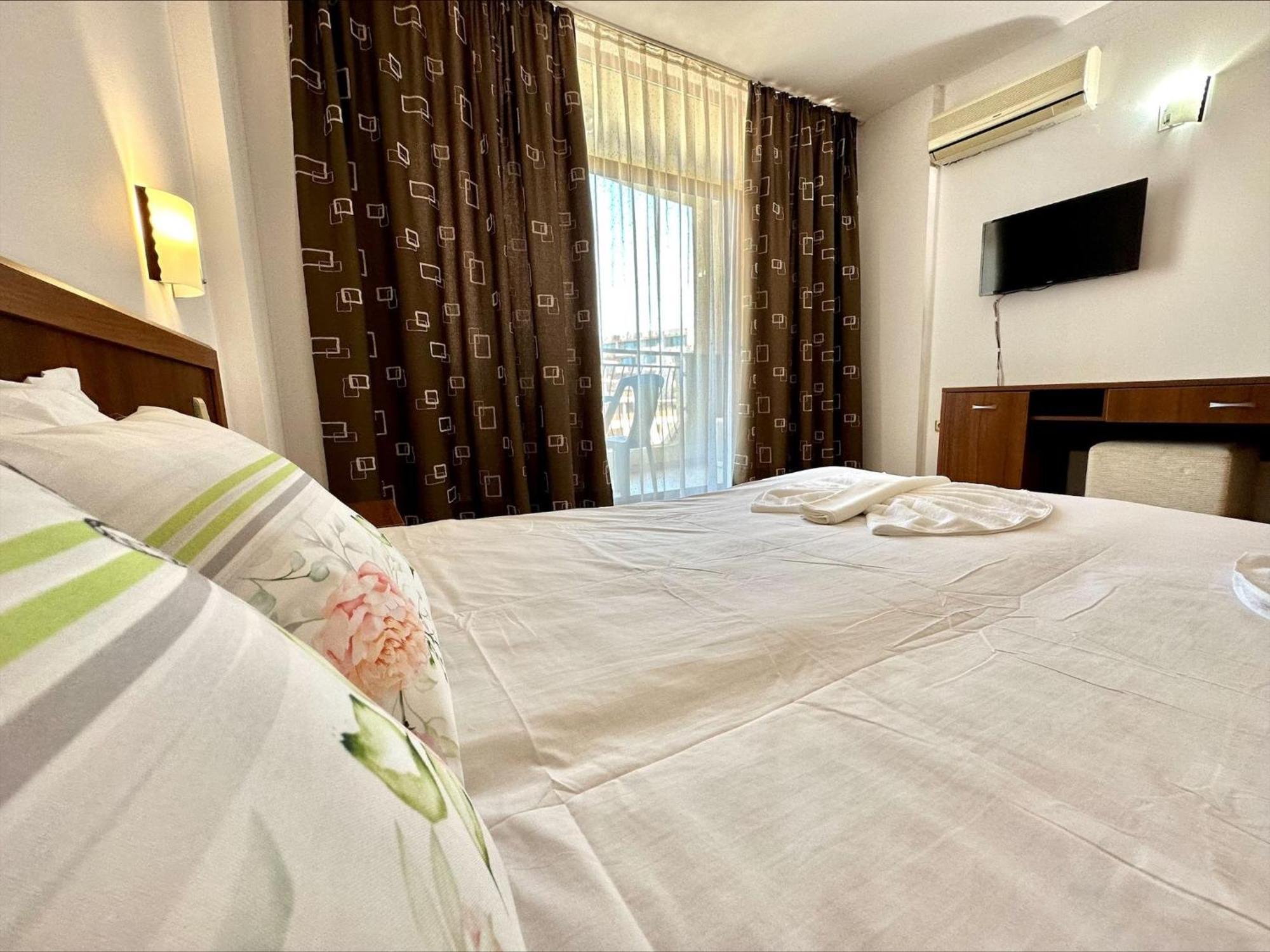 Grenada - Menada Apartments Pantai Sunny Bilik gambar
